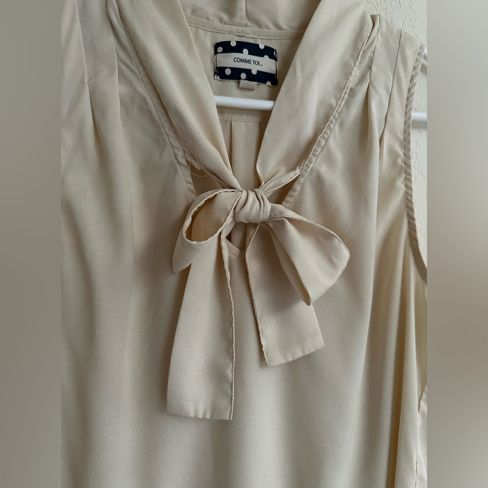 Elegant Cream Blouse with Bow Detail